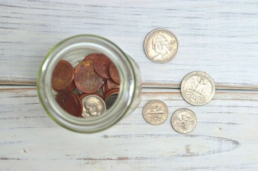 A couple of quaters in a jar. how much money is 100 quarters?